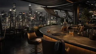 A rooftop function forty floors up, glass and city light.